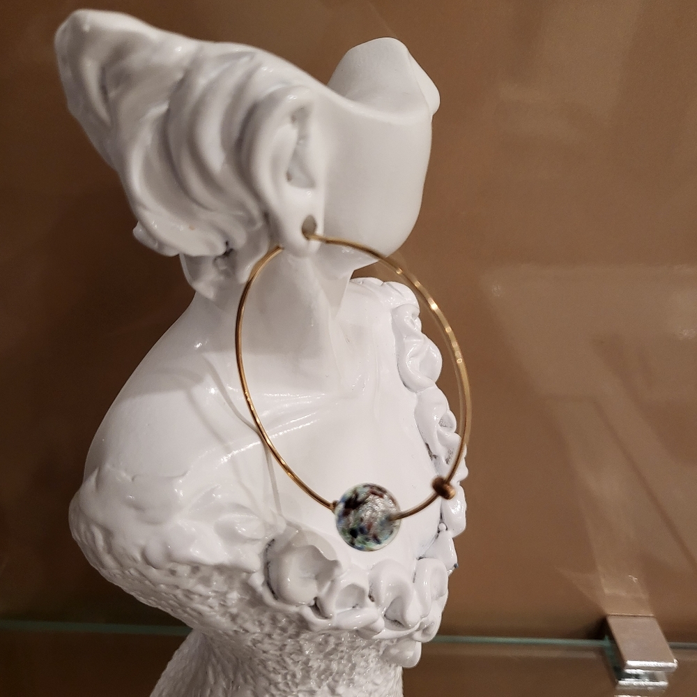 Venetian gold-plated handcrafted multicolored glass ball hoop earrings.